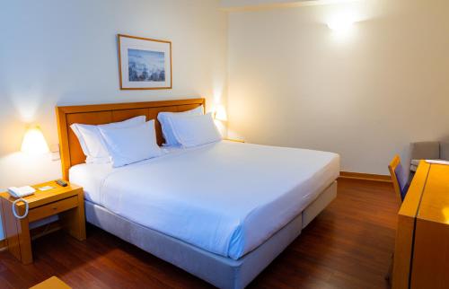 Habitación Triple Estándar del hotel Roma. Foto 1