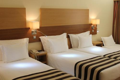 Habitación Cuádruple Estándar del hotel Principe Lisboa. Foto 4