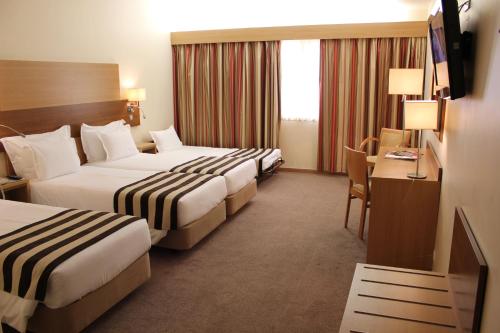 Habitación Cuádruple Estándar del hotel Principe Lisboa. Foto 8