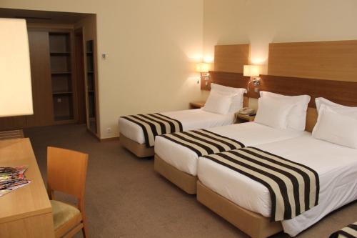Habitación Cuádruple Estándar del hotel Principe Lisboa. Foto 9