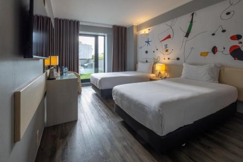 Habitación Doble con terraza - 2 camas del hotel 3k Barcelona. Foto 4
