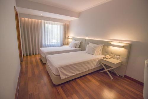 Habitación Doble con aparcamiento gratuito - 1 o 2 camas del hotel Travel Park Lisboa. Foto 4