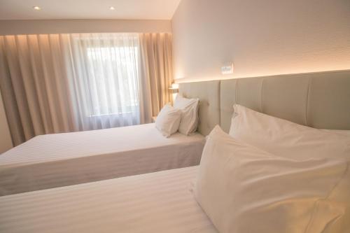 Habitación Doble con aparcamiento gratuito - 1 o 2 camas del hotel Travel Park Lisboa. Foto 5