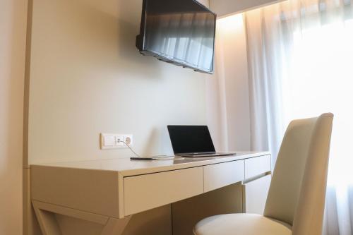 Habitación Familiar del hotel Travel Park Lisboa. Foto 1