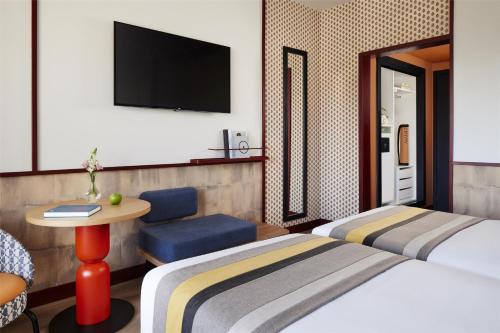 Habitación Premier Avani con cama supletoria del hotel Avani Avenida Liberdade Lisbon. Foto 1