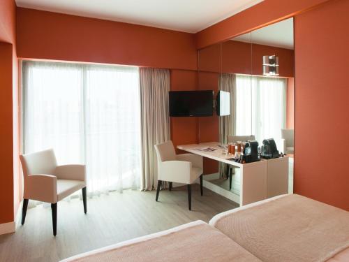 Habitación Doble Premium con balcón - 1 o 2 camas del hotel Lutecia Smart Design. Foto 6