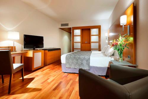 Habitación Doble con cama supletoria del hotel Eurostars Lisboa Parque. Foto 3