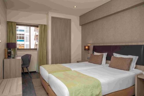 Habitación Executive - 2 camas del hotel Vip Inn Berna. Foto 1