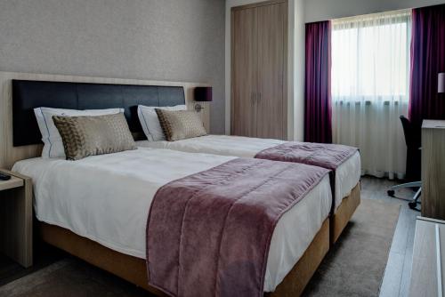 Habitación Executive - 2 camas del hotel Vip Inn Berna. Foto 7