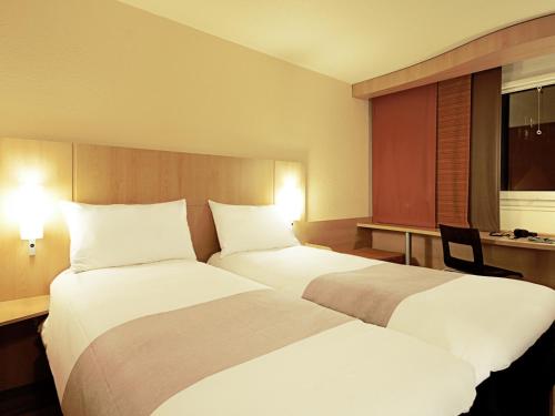 Habitación Doble Estándar - 2 camas del hotel Ibis Lisboa José Malhoa. Foto 17