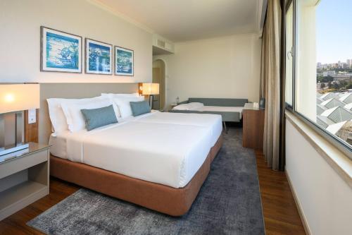 Habitación Familiar del hotel Meliá Lisboa Oriente. Foto 4