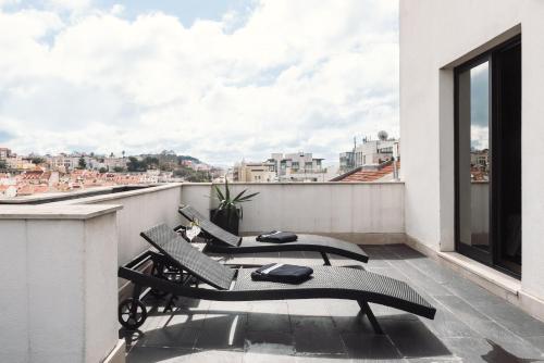 Habitación Superior con terraza - 2 camas del hotel Lisboa. Foto 2
