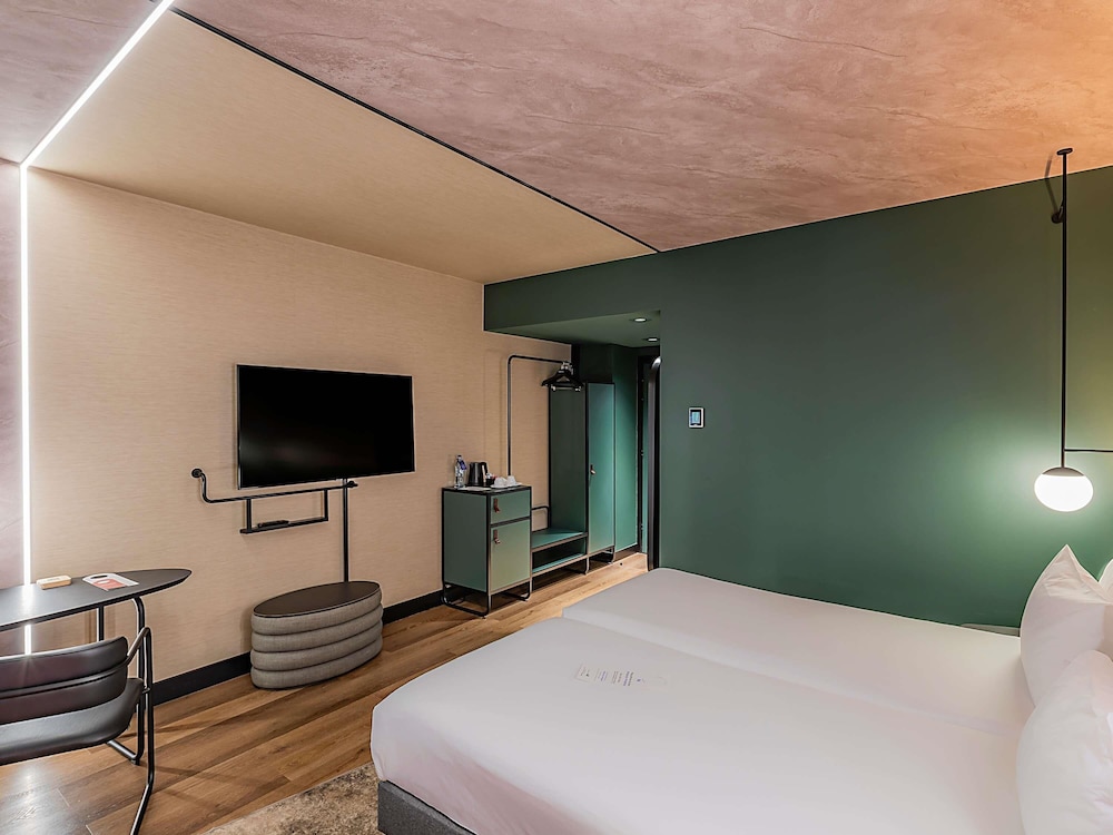Habitación superior, varias camas del hotel Novotel Lisboa. Foto 3