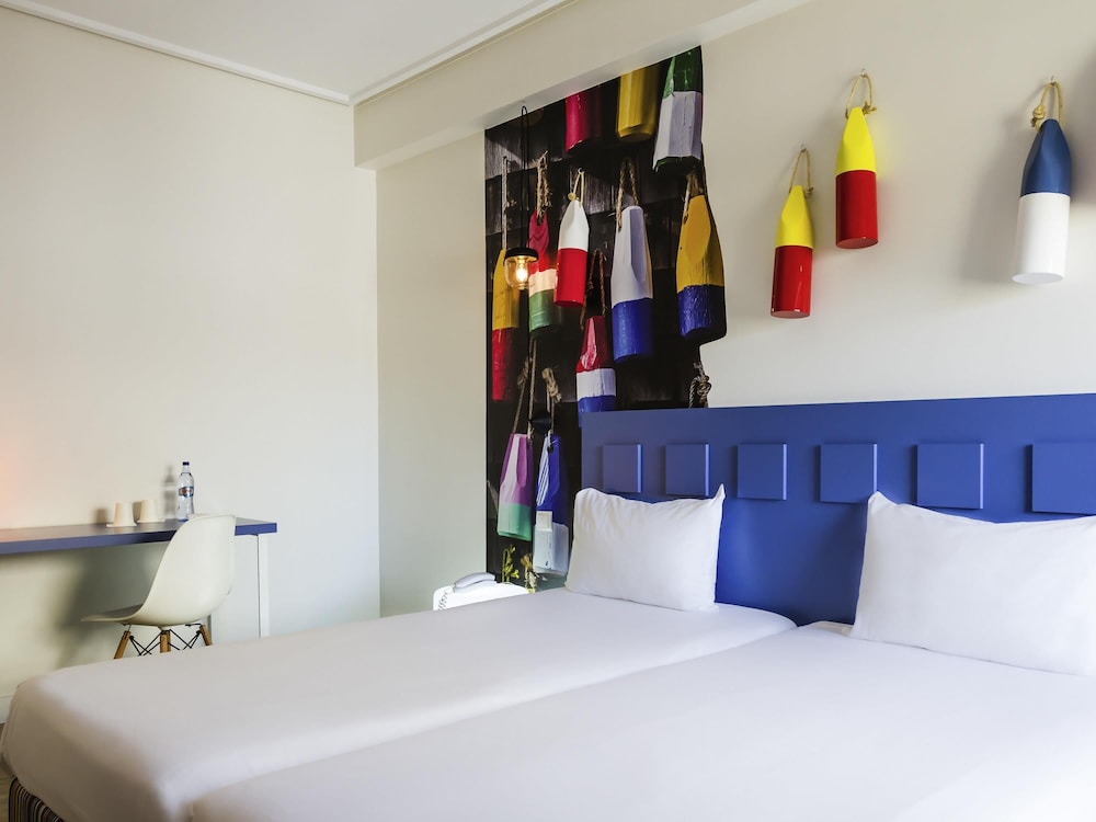 Habitación con 2 camas individuales, 2 camas individuales del hotel Ibis Styles Lisboa Centro Liberdade Ne