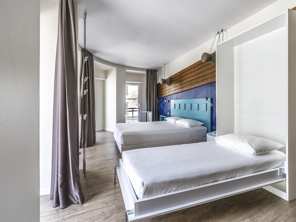 Habitación doble, varias camas del hotel Ibis Styles Lisboa Centro Liberdade Ne. Foto 10