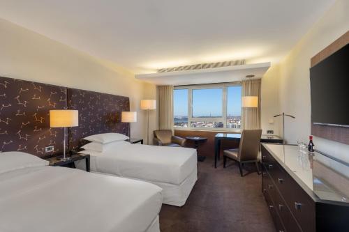 Habitación Premium Deluxe con vistas a la ciudad - 2 camas del hotel Sheraton Lisboa and Spa. Foto 5