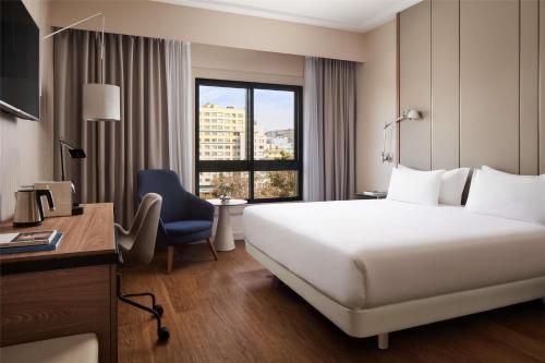 Habitación Doble Estándar - 1 o 2 camas del hotel NH Lisboa Campo Grande. Foto 1