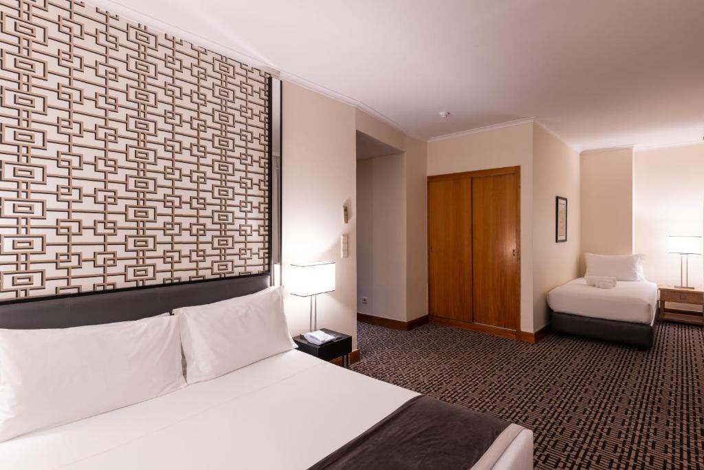 Habitación triple del hotel Mundial. Foto 1