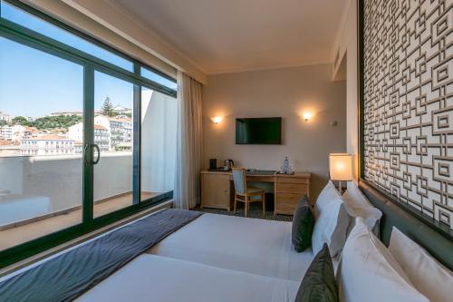 Habitación Doble Deluxe con balcón - 1 o 2 camas del hotel Mundial. Foto 1