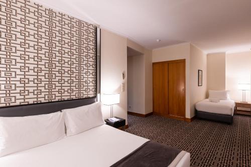 Habitación Triple del hotel Mundial. Foto 6