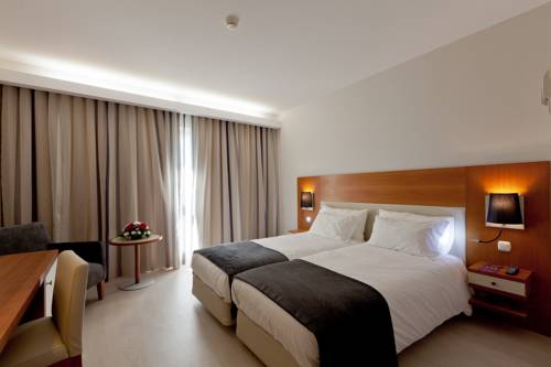 Habitación Doble Estándar - 2 camas del hotel Mercure Lisboa. Foto 1