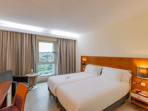 Habitación Doble Estándar - 2 camas del hotel Mercure Lisboa. Foto 4