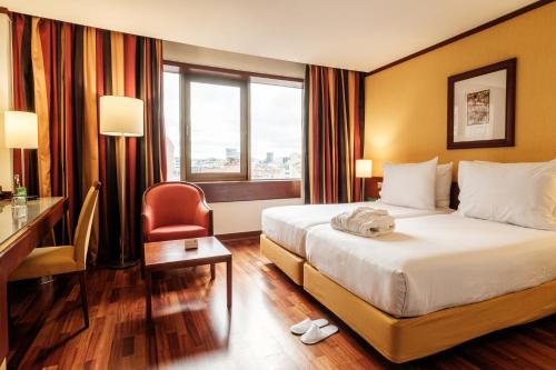 Habitación Doble Estándar - 2 camas del hotel Holiday Inn Lisbon Continental, An Ihg. Foto 1