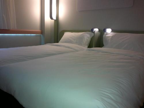 Habitación Doble Estándar - 2 camas del hotel Ibis Budget Braga Centro. Foto 6
