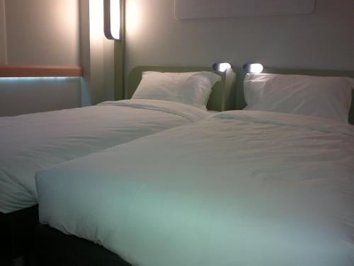 Habitación Doble Estándar - 2 camas del hotel Ibis Budget Braga Centro. Foto 8
