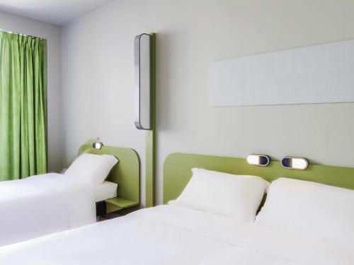 Habitación Estándar con 1 cama doble y 1 individual del hotel Ibis Budget Braga Centro