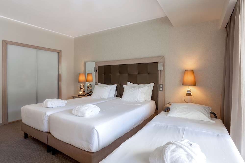 Habitación Triple Estándar del hotel Porta Do Sol Conference Center and Spa. Foto 2