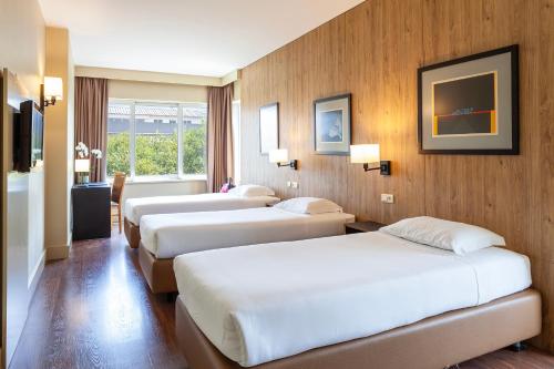 Habitación Cuádruple del hotel Fundador. Foto 1