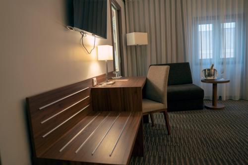 Habitación Triple Estándar del hotel THE ONE Grand Hotel da Póvoa. Foto 2