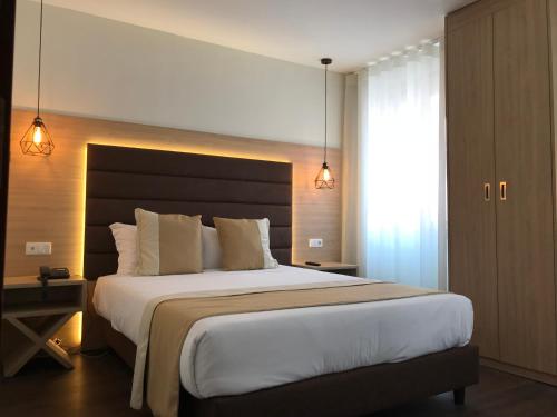 Habitación Doble Deluxe con vistas a la ciudad - 1 o 2 camas del hotel THE ONE Grand Hotel da Póvoa