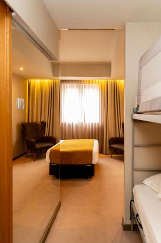 Habitación Familiar Superior del hotel WOT Porto. Foto 1