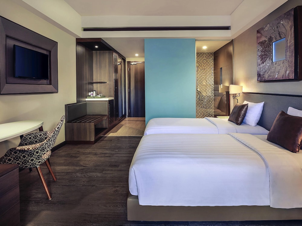 Habitación Deluxe, Balcón - 2 Camas Individuales del hotel Mercure Bali Legian. Foto 2
