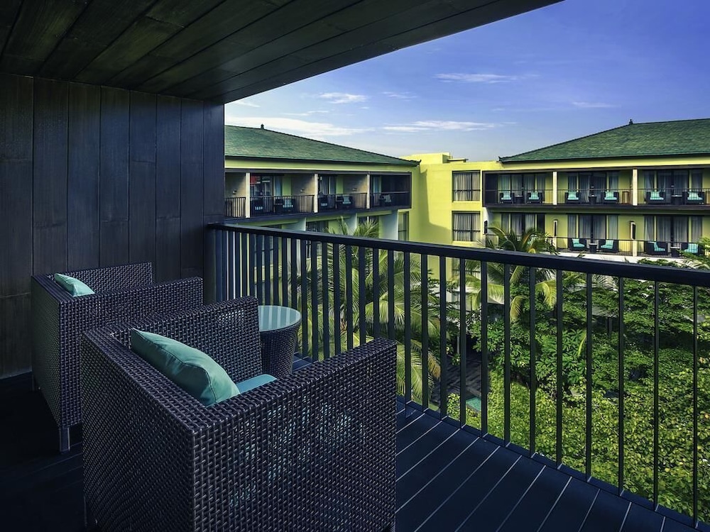 Habitación Deluxe, Balcón - 2 Camas Individuales del hotel Mercure Bali Legian. Foto 4