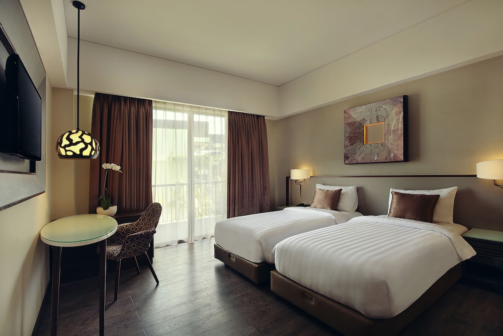 Habitación Superior - 2 camas individuales del hotel Mercure Bali Legian. Foto 1
