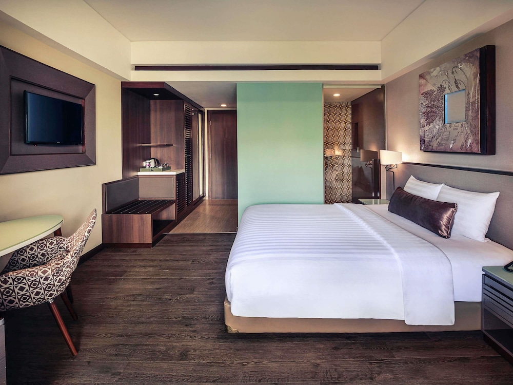 Habitación Deluxe, Balcón - 1 Cama King del hotel Mercure Bali Legian. Foto 5