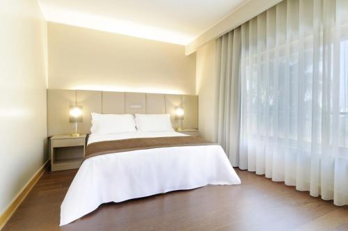 Suite Prémium con 1 cama doble - No fumadores del hotel Tryp By Wyndham Porto Expo. Foto 2