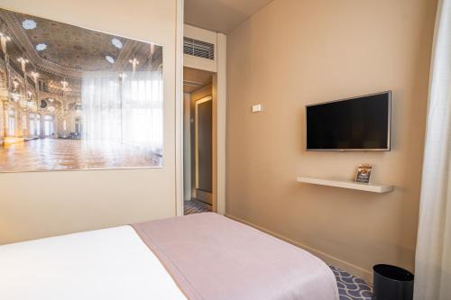 Habitación Individual Confort del hotel Dom Henrique Downtown. Foto 2