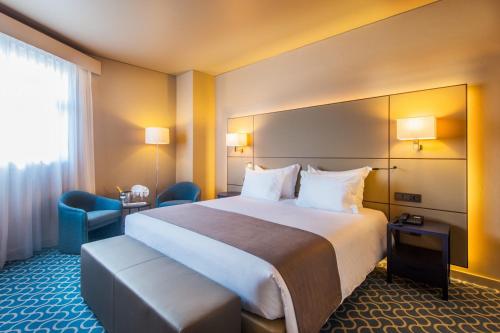 Habitación Doble Confort con cama grande del hotel Dom Henrique Downtown