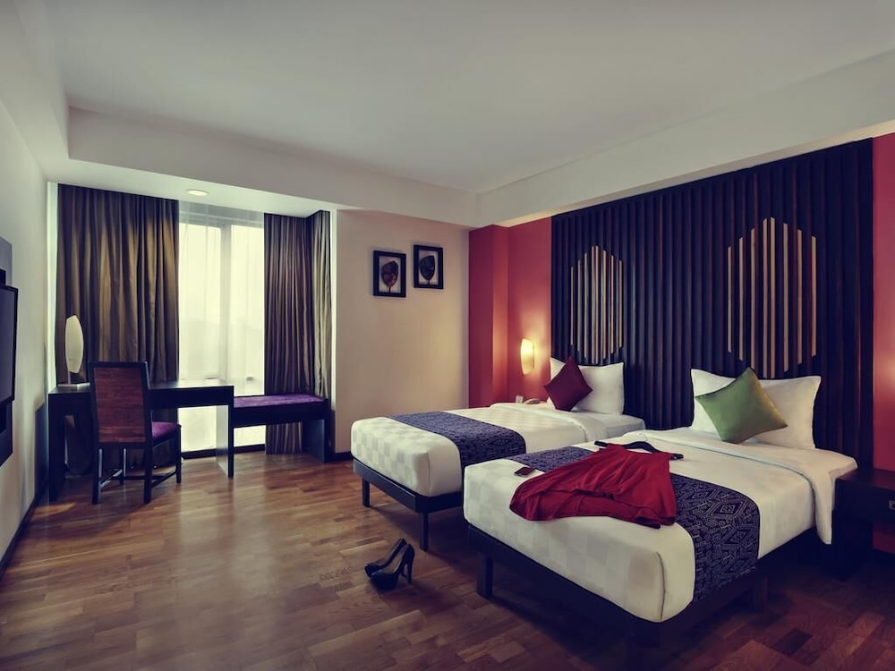 Habitación Superior con Dos Camas Individuales del hotel Mercure Pontianak City Center. Foto 4