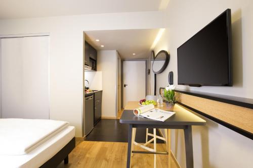 Estudio con camas individuales del hotel Adagio Access München City Olympiapark. Foto 6