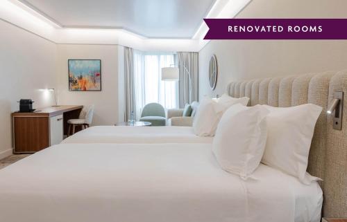 Suite Junior con 2 camas individuales - Planta superior del hotel Crowne Plaza Porto, An Ihg. Foto 2
