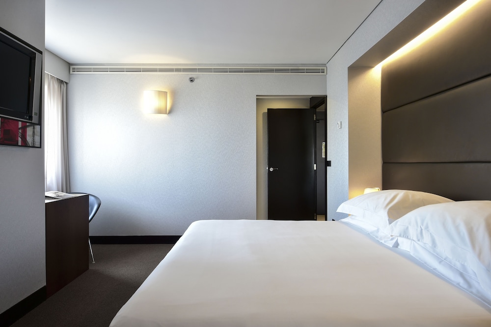 Suite Deluxe, vistas a la ciudad del hotel Porto Palácio By The Editory. Foto 2