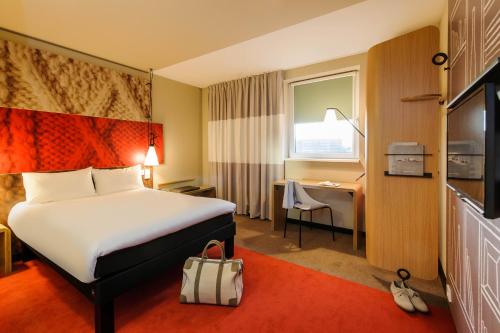 Suite Familiar Estándar con 2 habitaciones comunicadas del hotel Ibis Hamburg City. Foto 1