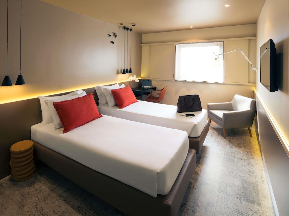 Habitación superior, 2 camas individuales, vistas a la ciudad del hotel Mercure Porto Centro Santa Catarina. Foto 5
