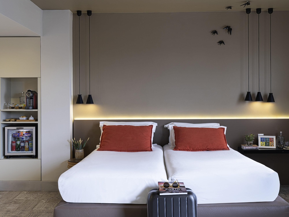 Habitación triple clásica, 2 camas individuales (and 1 sofa) del hotel Mercure Porto Centro Santa Catarina