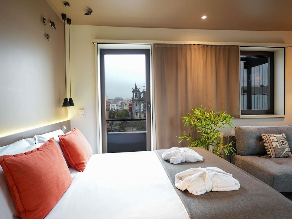 Suite junior, 1 cama doble con sofá cama del hotel Mercure Porto Centro Santa Catarina. Foto 4